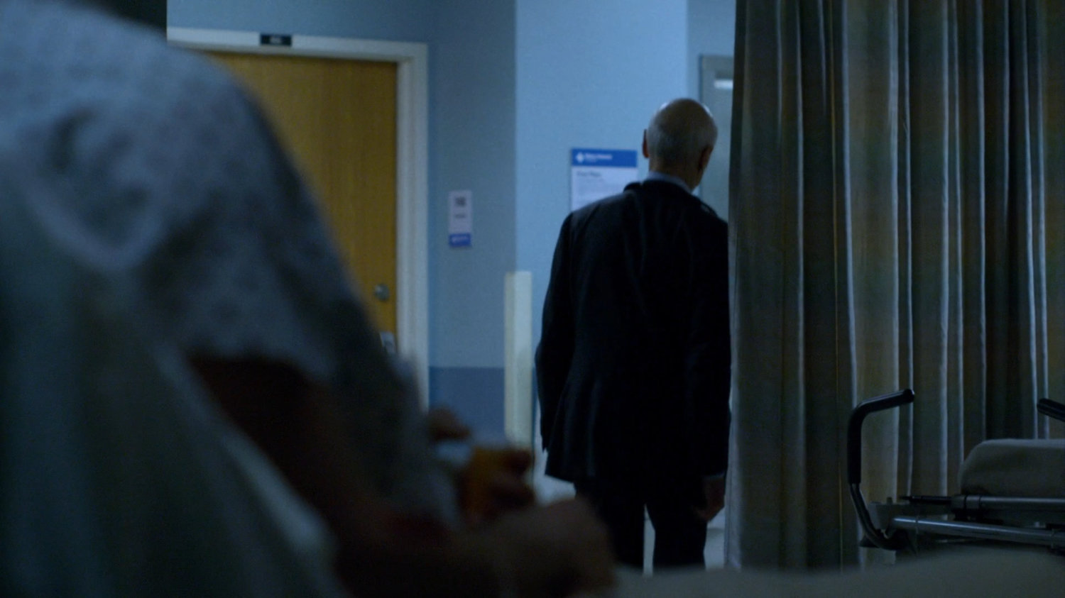 Dr. Kozlov leaving Metro-General hospital room.