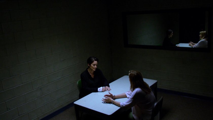 Pam and Jeri in interrogation room.
