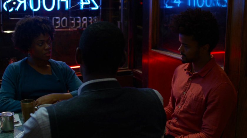 Malcolm and other Kilgrave's anonymous members meeting in Broadway Restaurant at night.