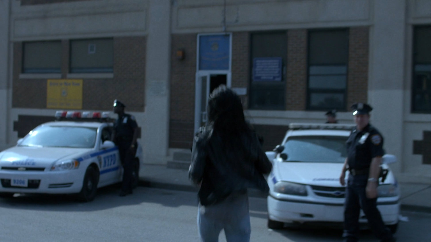 Jessica outside the entrance to Northeastern Correctional Facility.