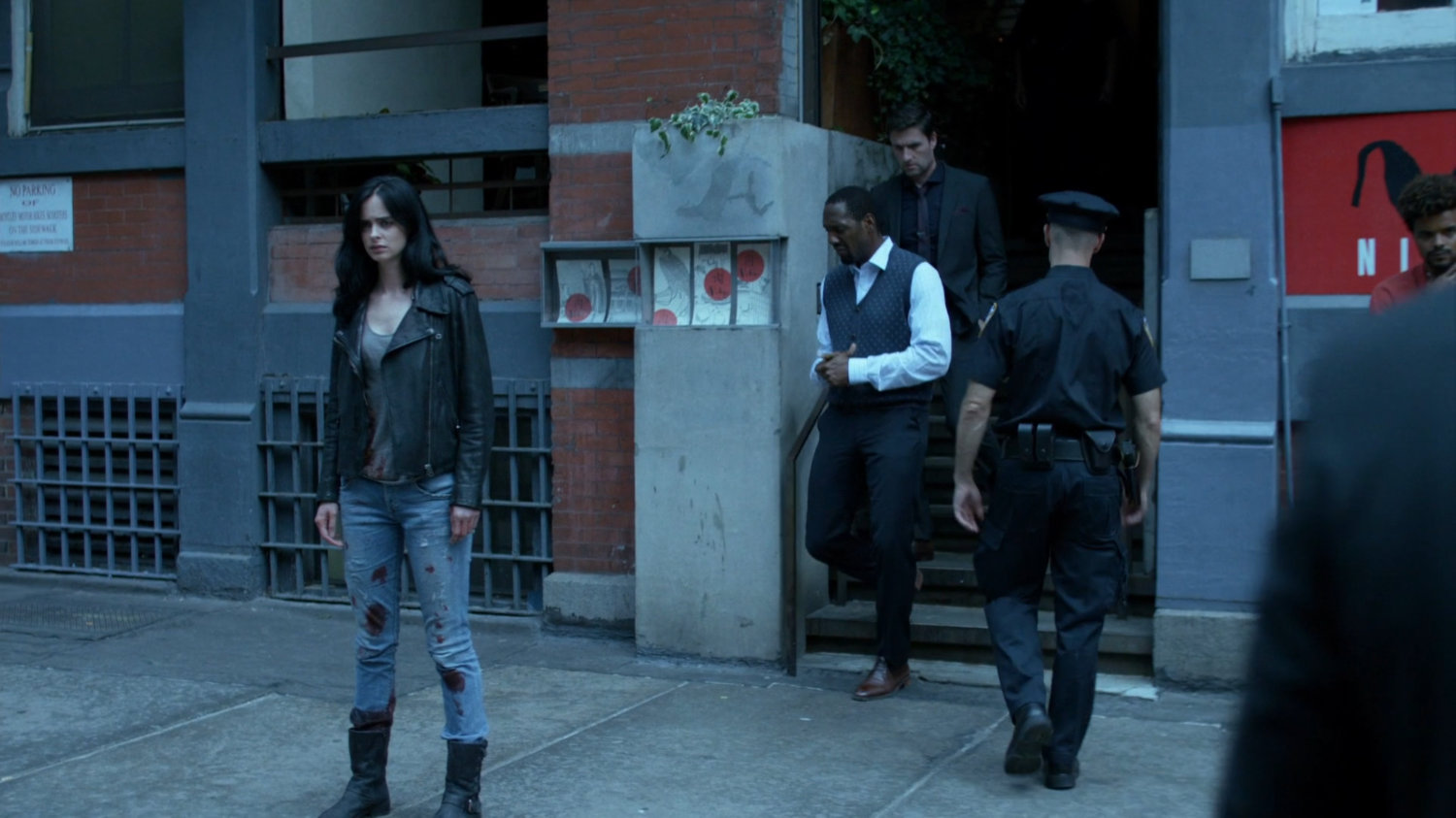 Jessica and others on sidewalk outside Niku Japanese restaurant.