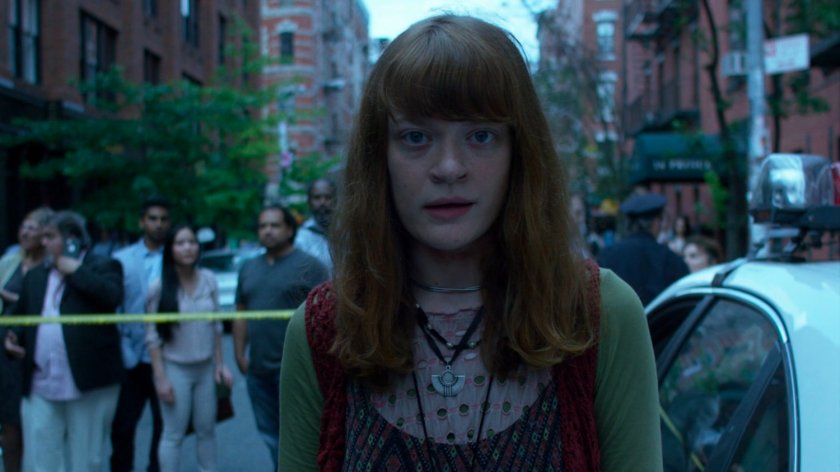 Robyn being interviewed by police outside Niku Japanese restaurant.