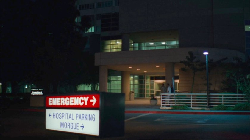 Exterior of St. Vincent's Hospital at night.