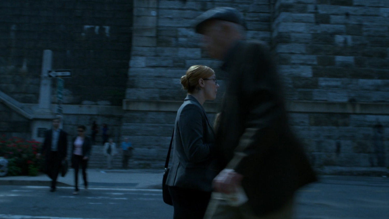 Pedestrians outside the Old Morgue,