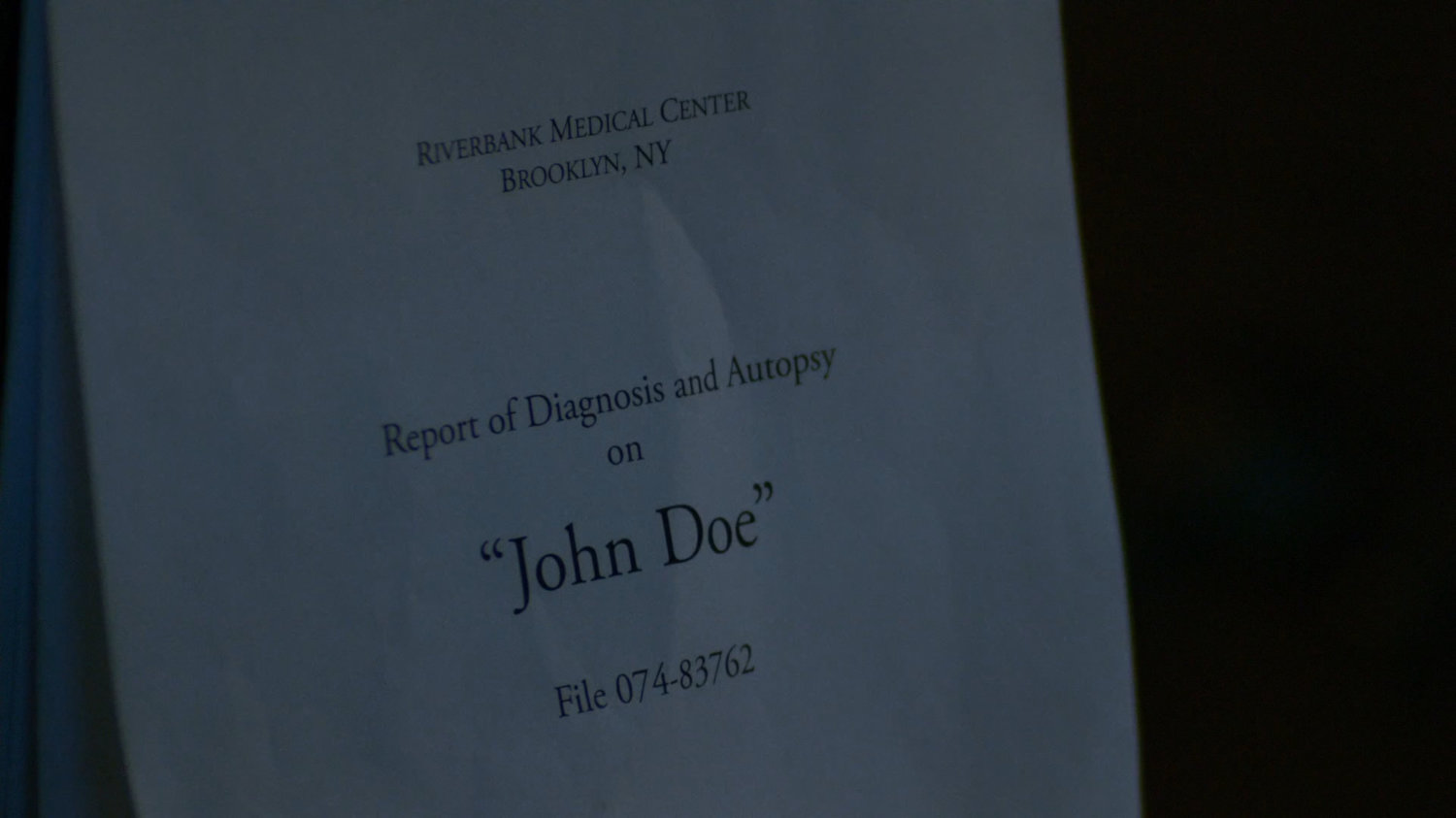 Medical report on John Doe cover sheet.