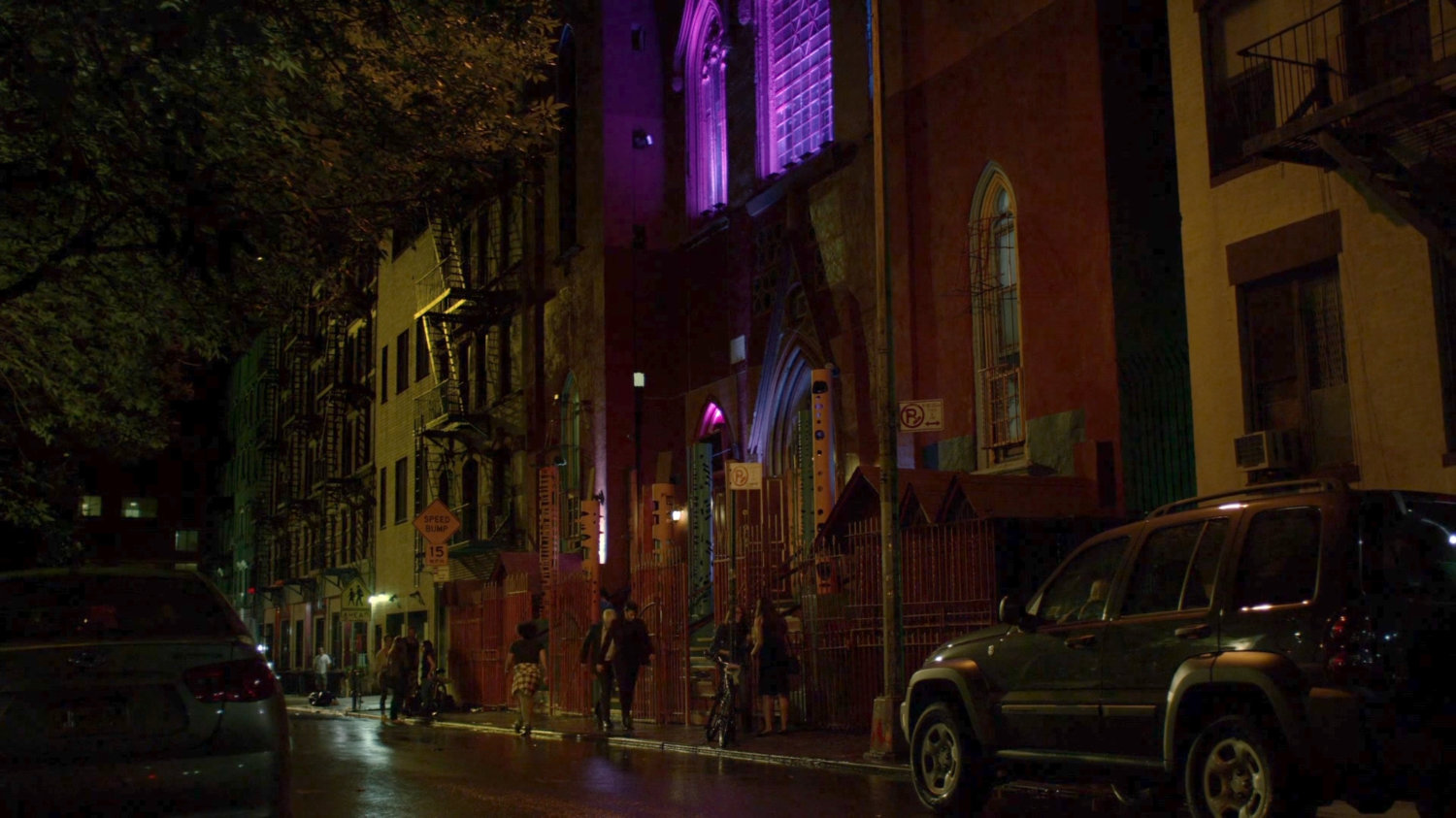 Kilgrave and Albert walking out of Delaney Hall.