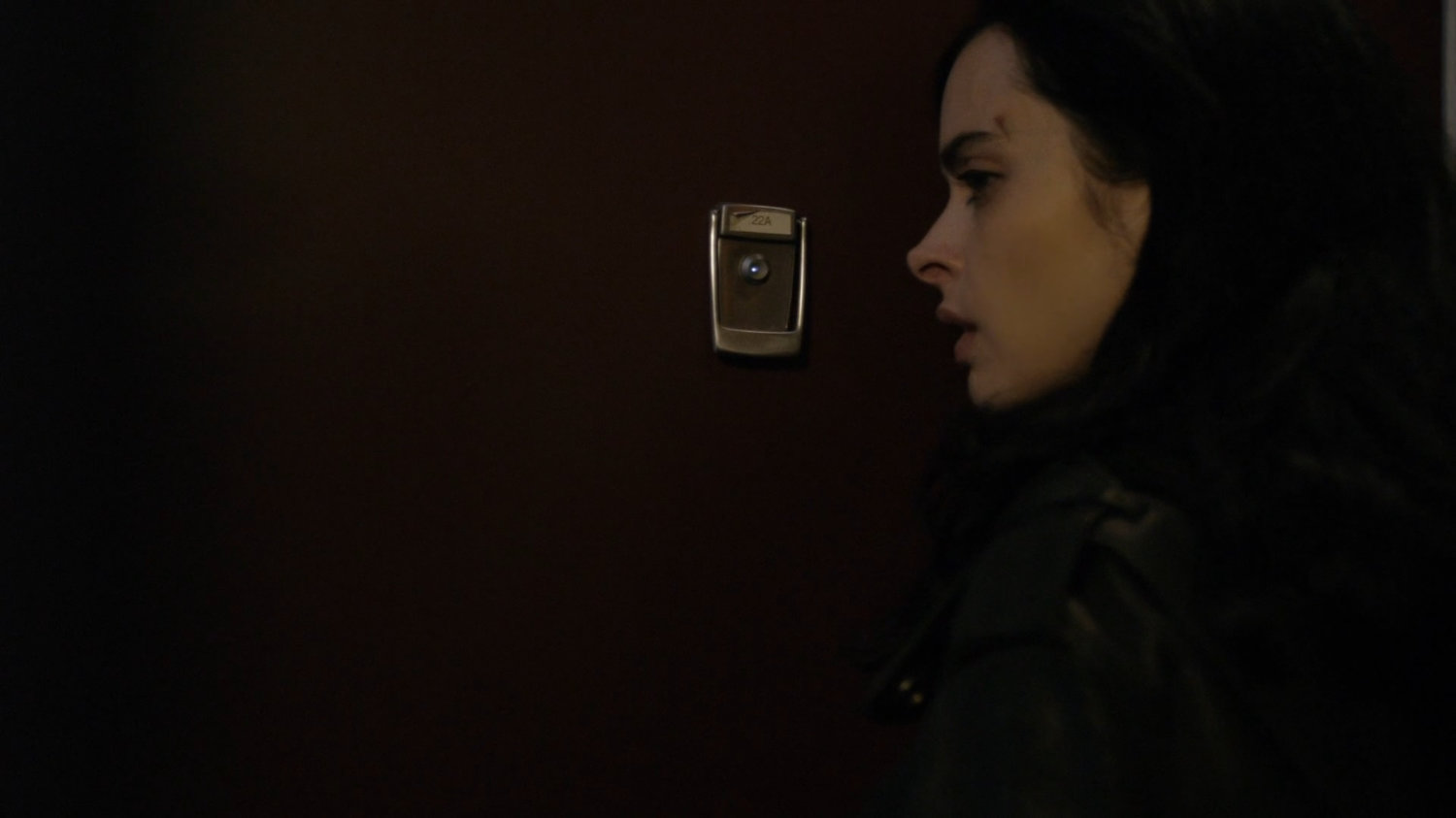Jessica at the front door of New York penthouse.