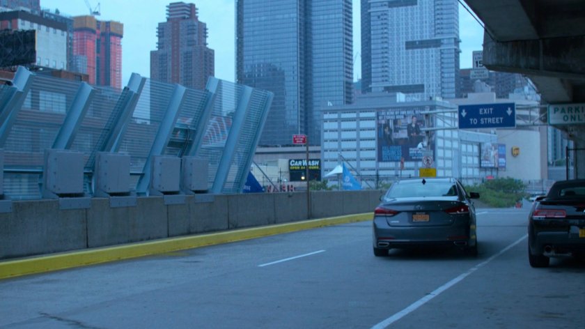 Trish driving away from roadside.