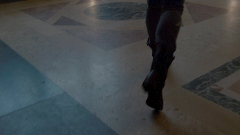 Jessica walking across Hudson Ferry Terminal floor.