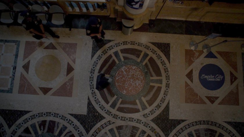 High angle shot of Police Officers surrounding Jessica.