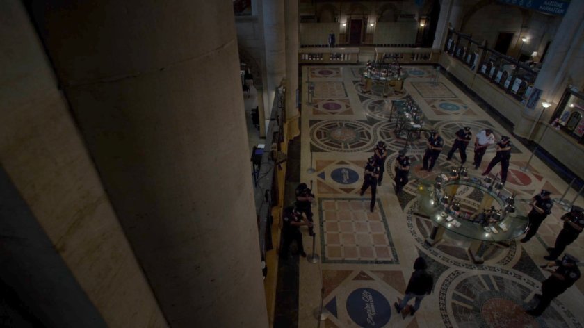 Police Officers surround Jessica in Hudson Ferry Terminal.