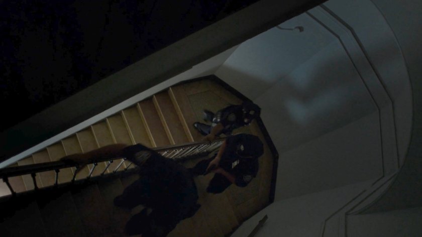 Officers run up stairs in Hudson Ferry Terminal.