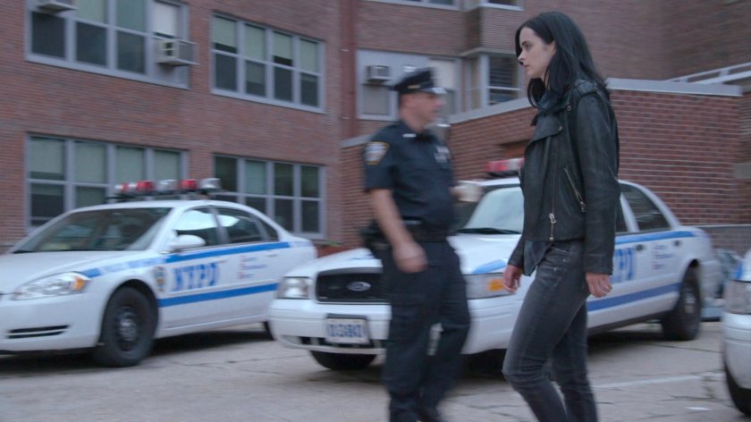 Jessica crossing 15th Precinct parking lot.
