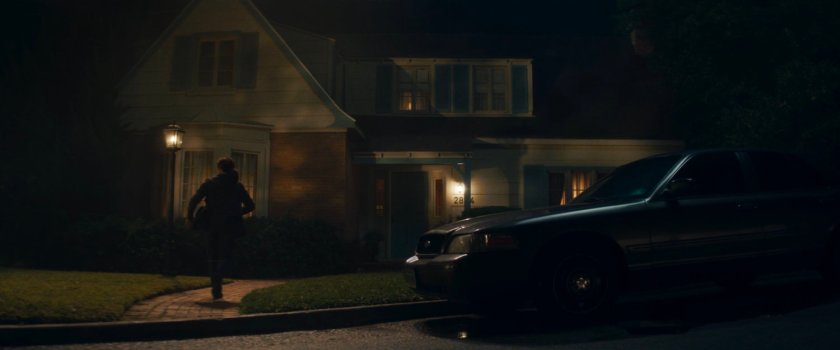 Agnes outside her house.