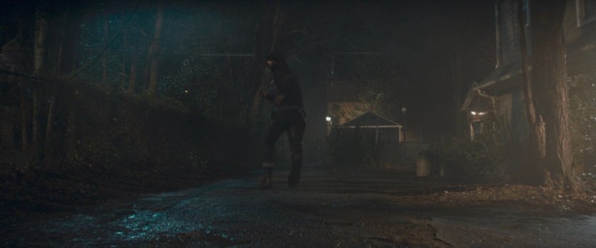 Teen running down alley behind Agnes's house.