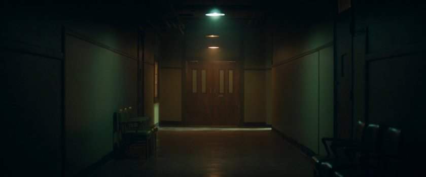 Empty hallway in Westview coroner at night.