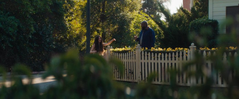 Agatha and Herb by his fence.