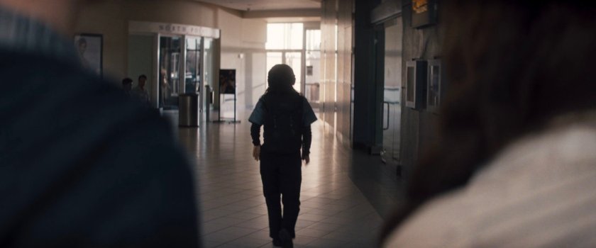 Alice walking in Westview Mall.