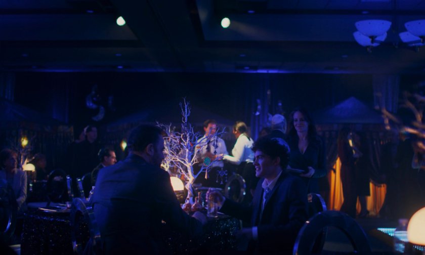 William Kaplan with his parents at his Bar Mitzvah party.