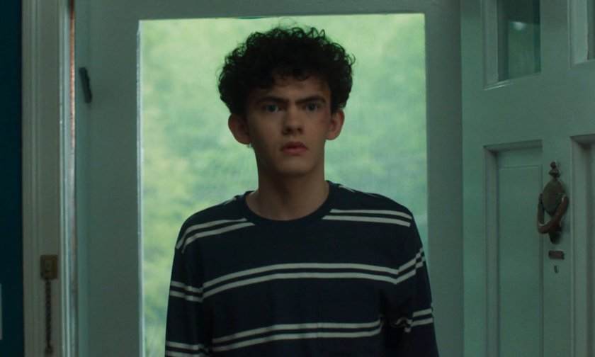 Billy entering their house.