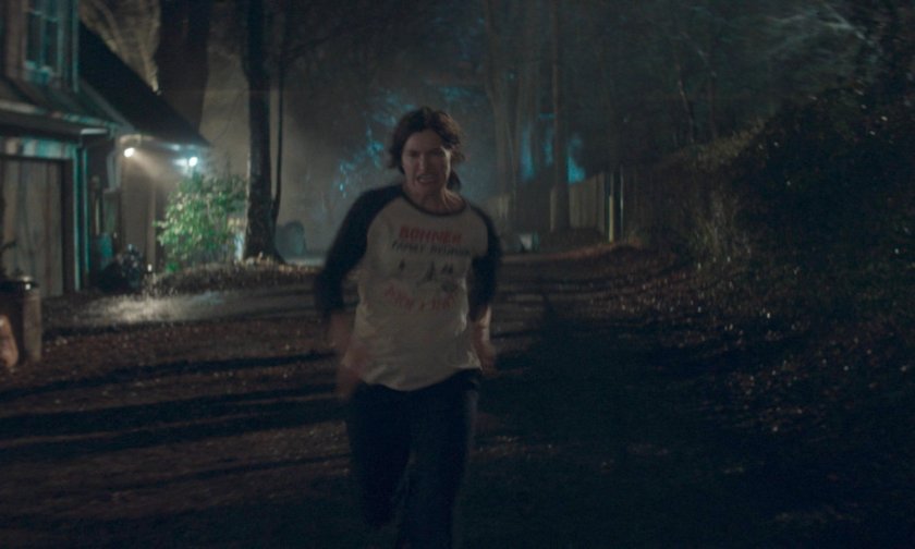 Agatha running down alley behind her house.