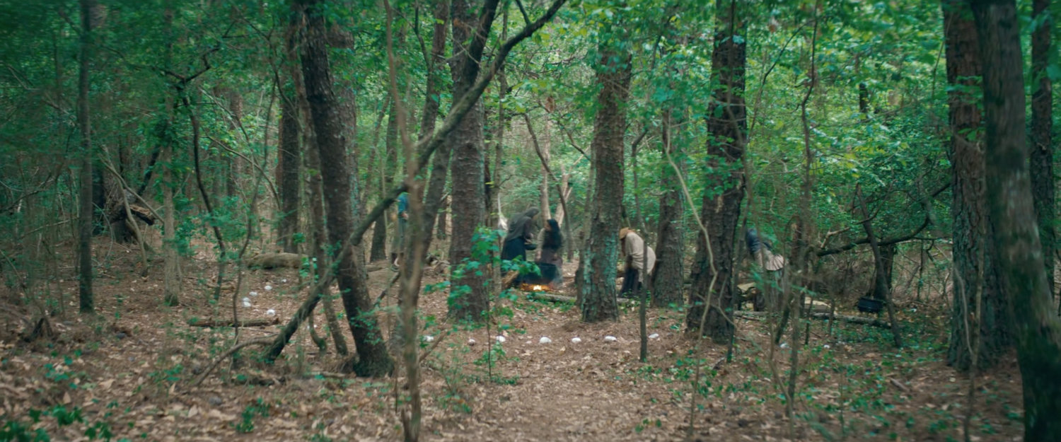 Witch coven in New England woods, 1750.