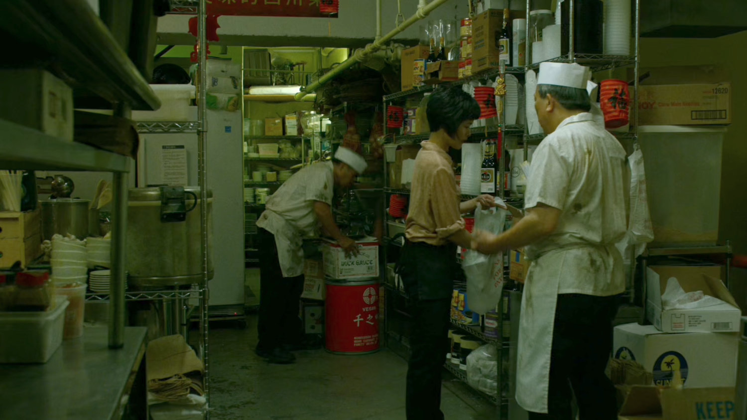 Workers in a Chinese kitchen.