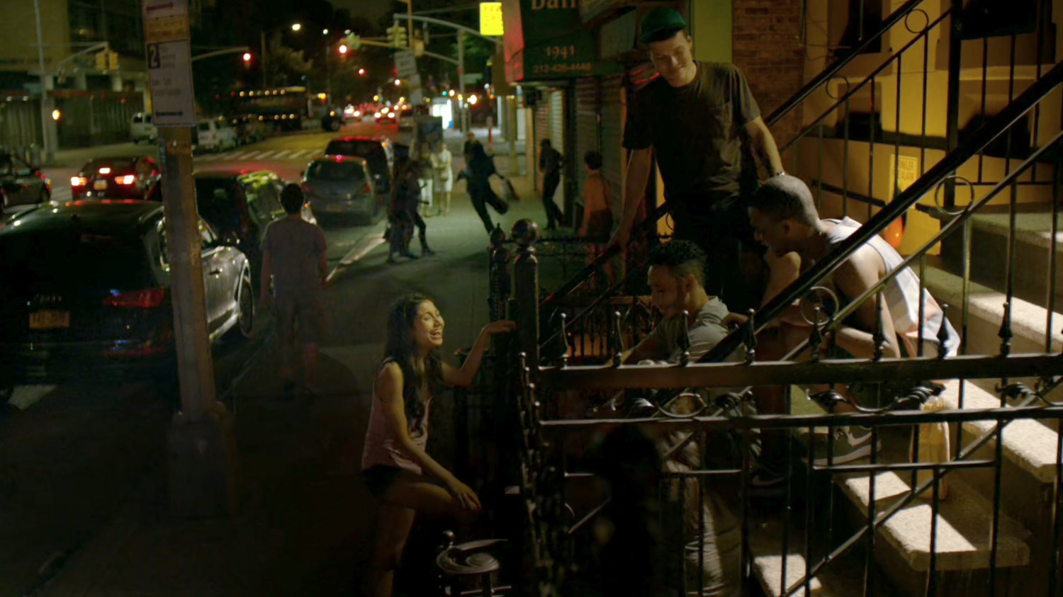 Citizens on a stoop by a church.