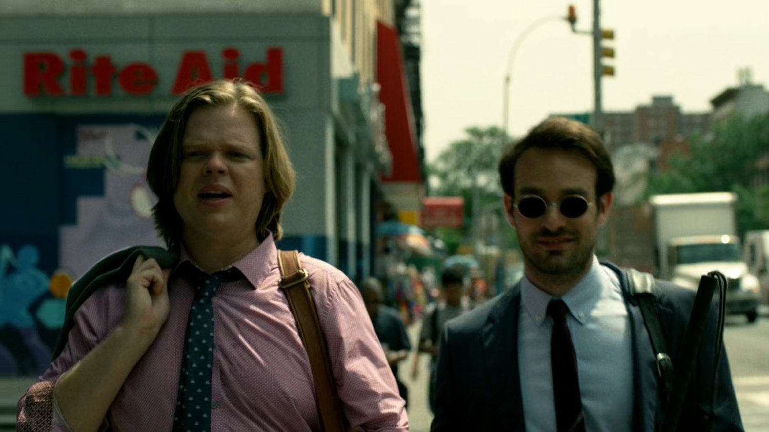 Matt and Foggy on a New York sidewalk.