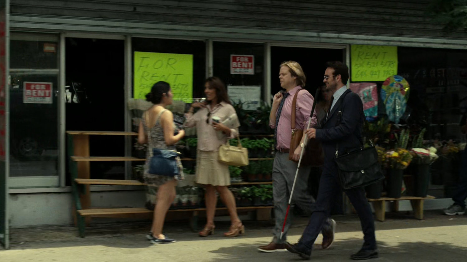 Matt and Foggy on a New York sidewalk.