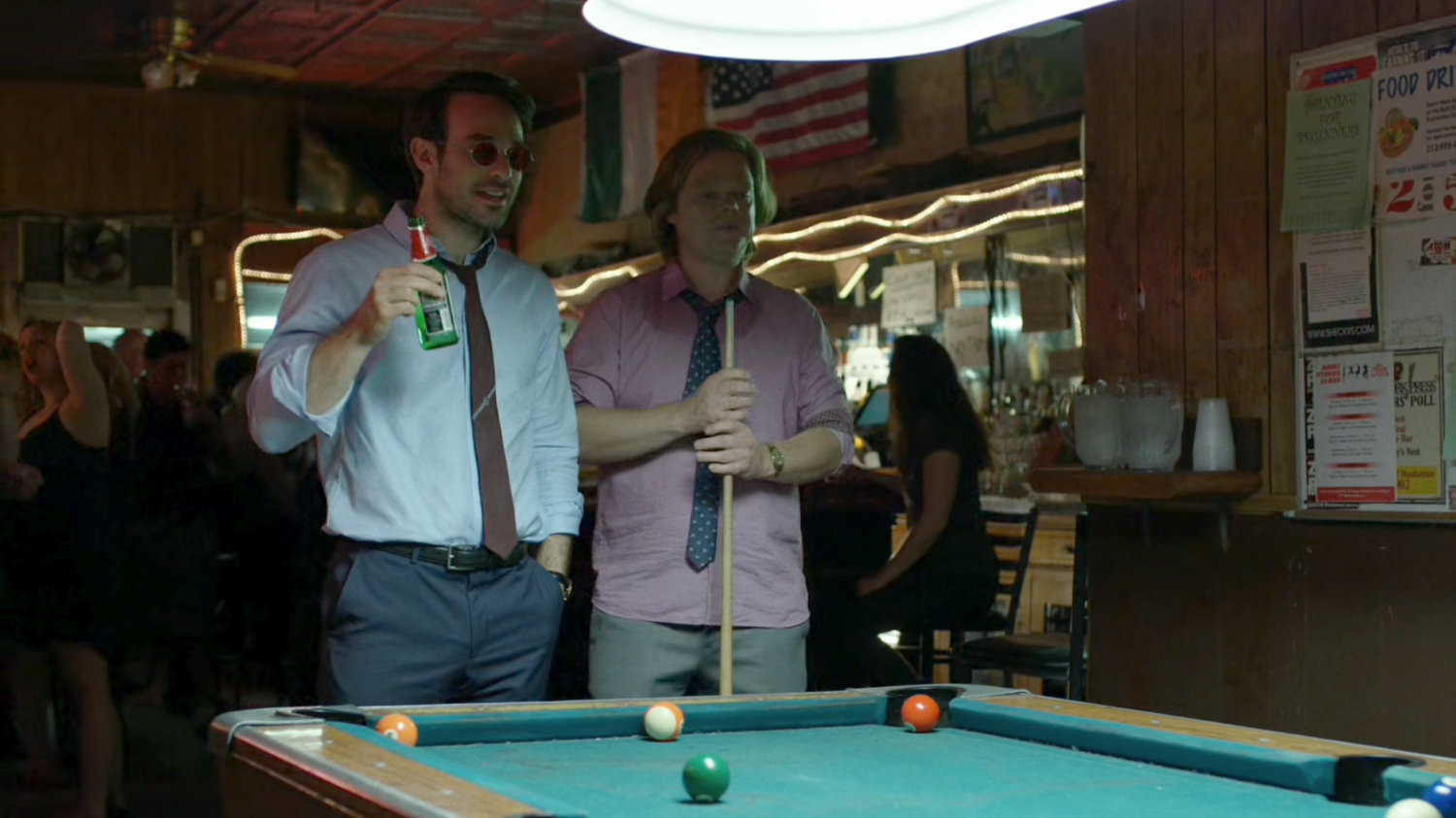 Matt and Foggy around a pool table at Josie's Bar.