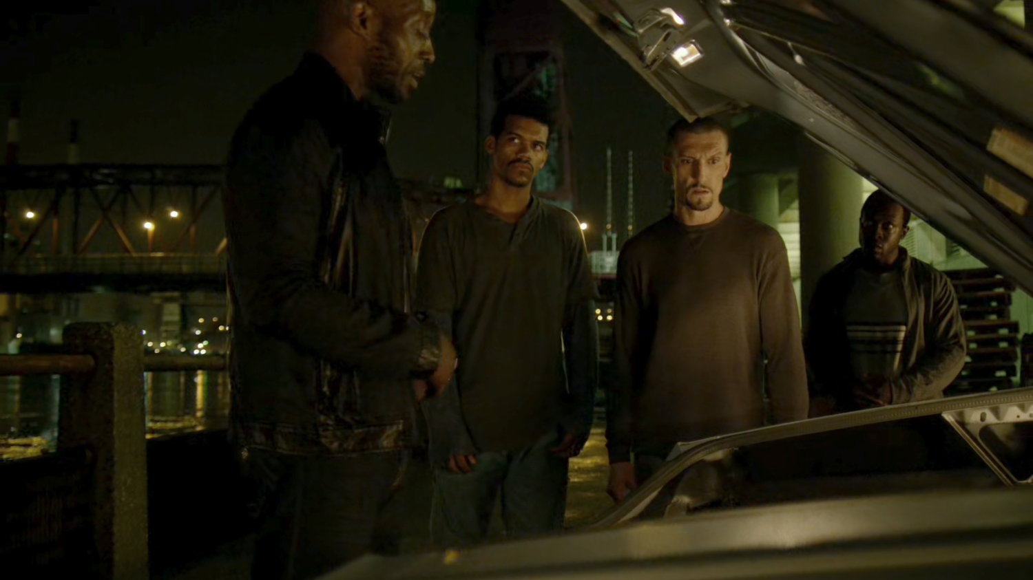 Turk selling weapons out of his car trunk.