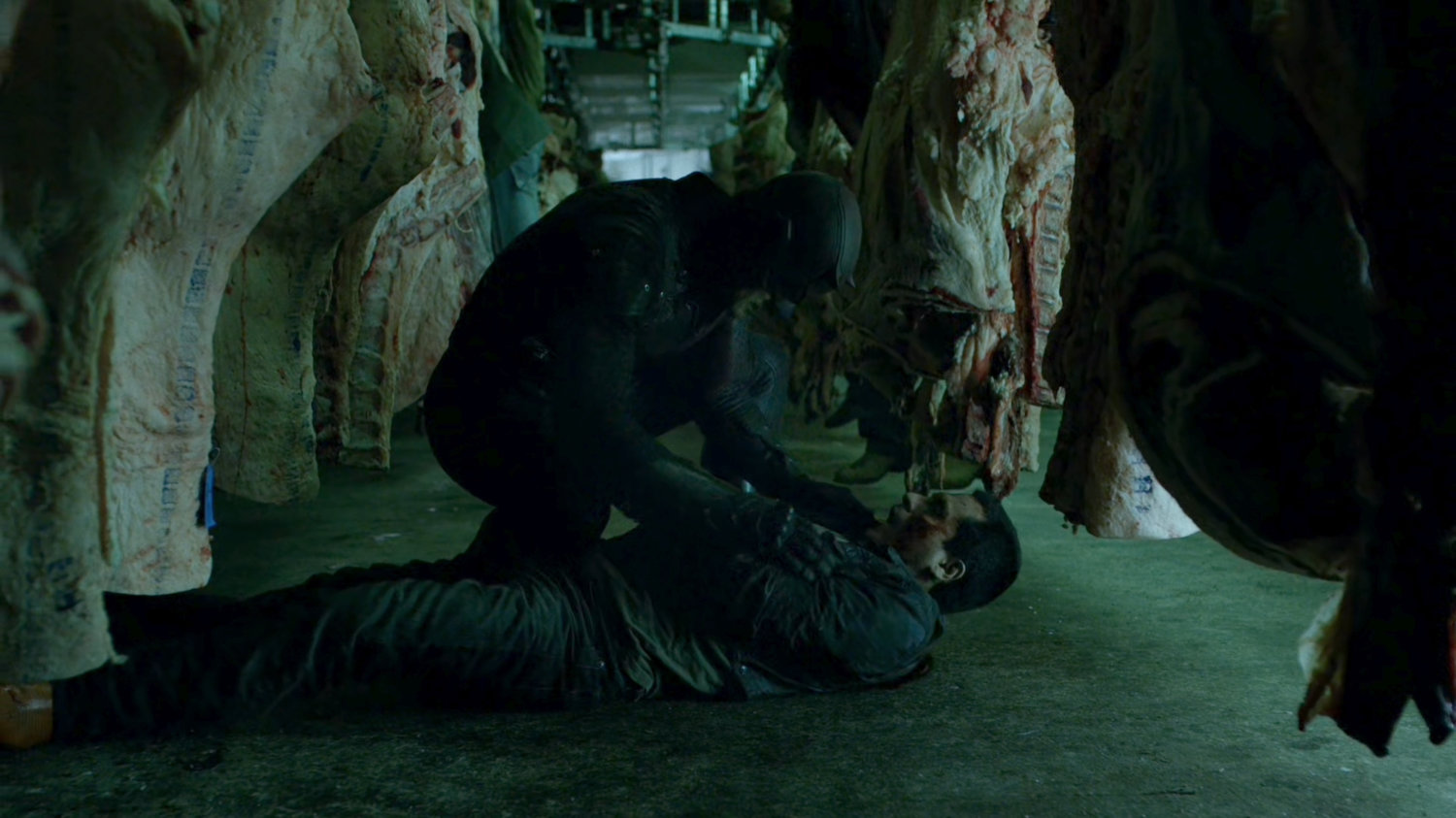 Daredevil investigating a meat packing plant freezer.