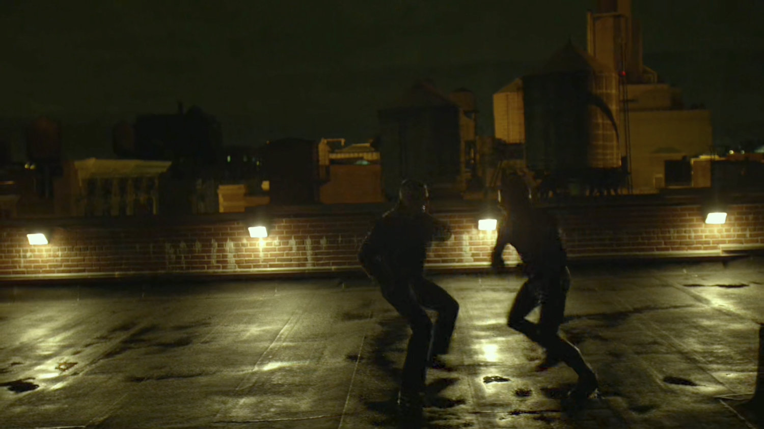 Matt and Frank fighting on the rooftop of Metro-General.