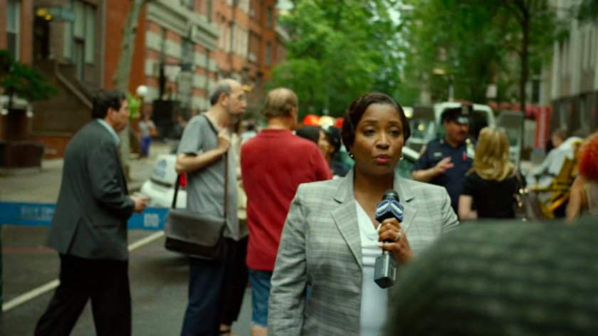 Reporters and onlookers outside Metro-General hospital exit.