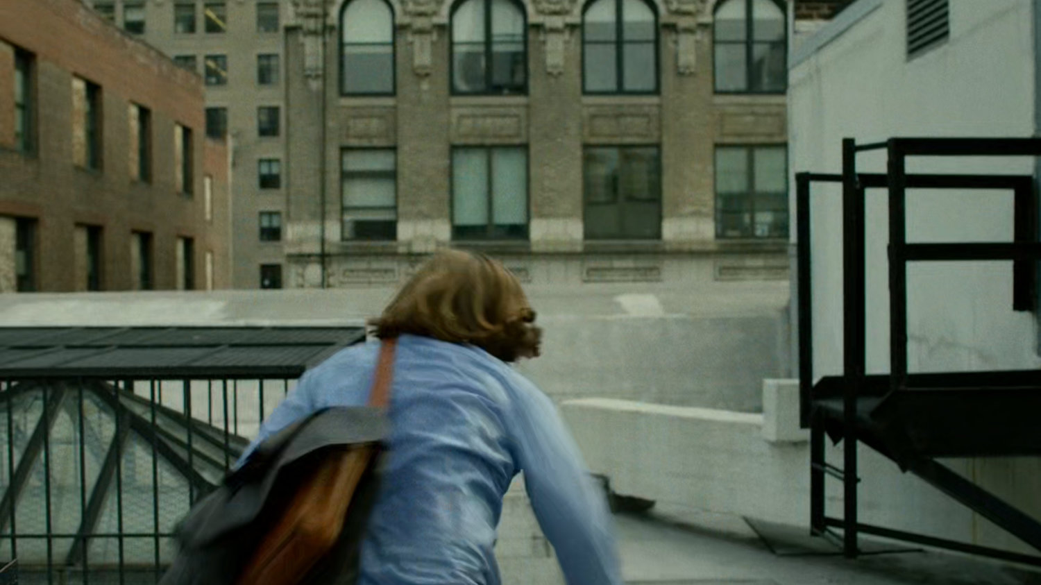Foggy running across rooftop.