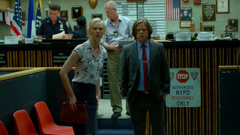 Foggy and Karen by the front desk of the 15th Precinct.