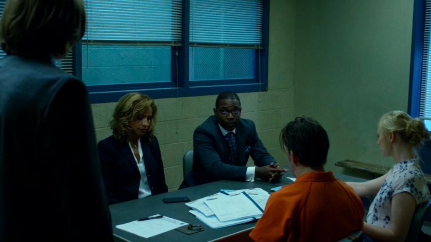 Karen, Foggy, Reyes, and Tower listen to Grotto in a 15th Precinct interrogation room.