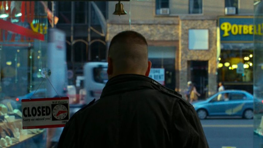 Frank Castle locks the entrance to the pawn shop.