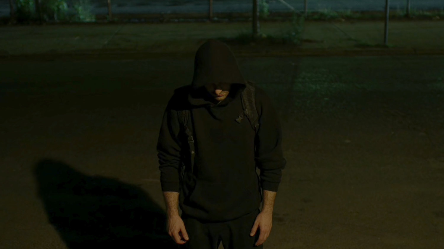 Matt standing outside Frank Castle's apartment building.