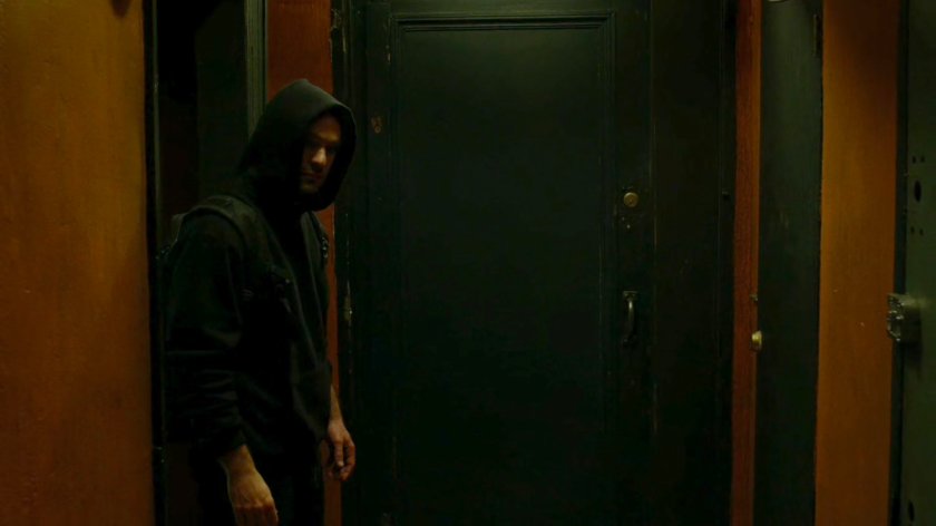 Matt in the hallway of Frank Castle's apartment building.