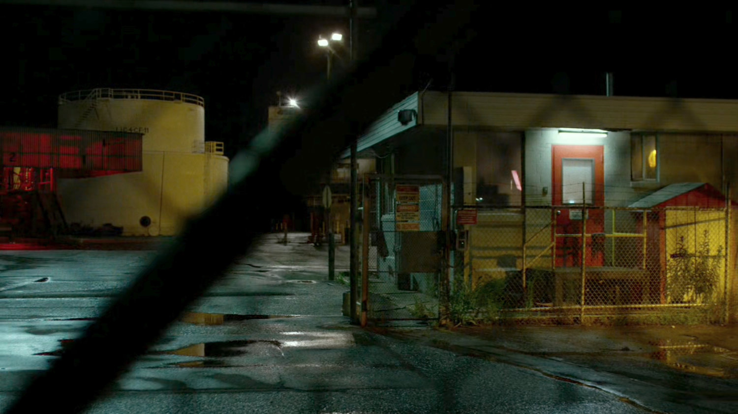 Exterior of refinery at night.