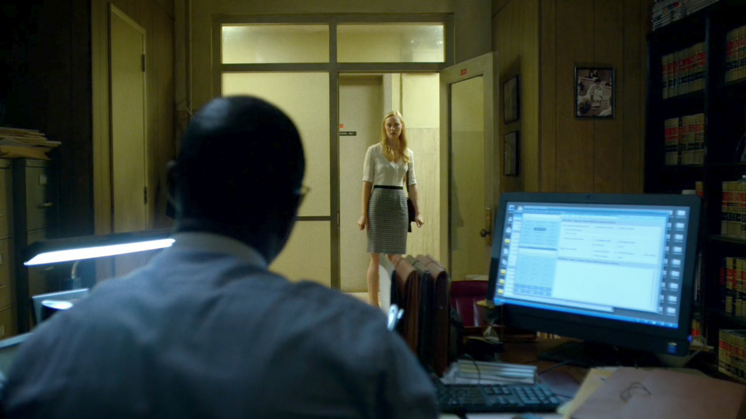 Karen entering ADA Blake Tower's office.