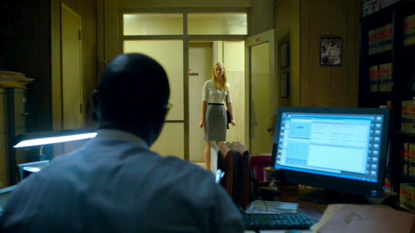 Karen entering ADA Blake Tower's office.