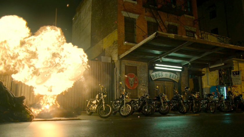 Motorcycles exploding outside Dogs of Hell bar.
