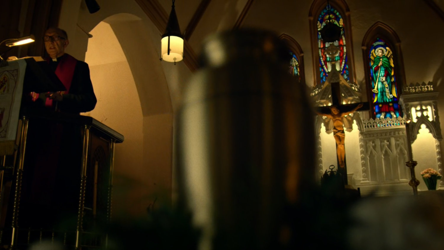Father Lantom give eulogy for Grotto in church.