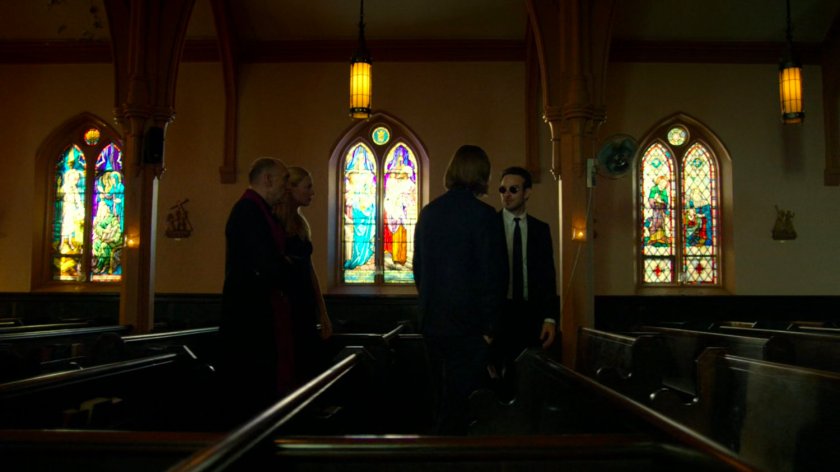 Father Lantom, Matt, Karen, and Foggy in church.