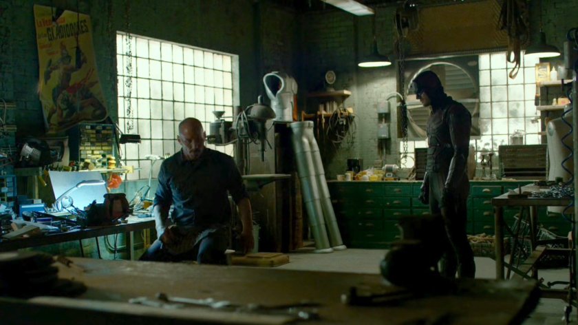 Daredevil talking to Melvin Potter in his workshop.