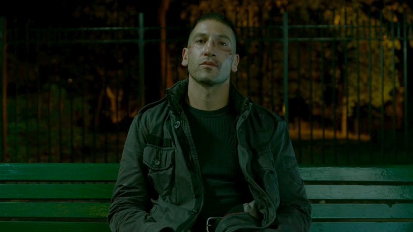 Frank Castle on a park bench.