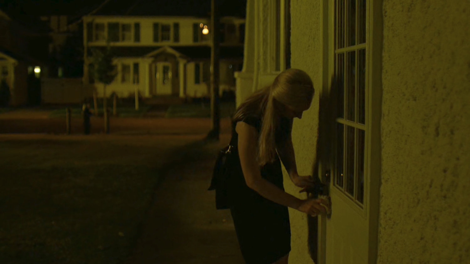 Karen breaking into Frank Castle's house.